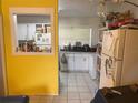 Kitchen with white cabinets and granite countertops at 1528 Stevensons Dr, Clearwater, FL 33755