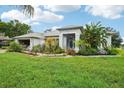 One-story house with a landscaped yard at 289 Dandelion Ct, Spring Hill, FL 34606