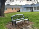 Relaxing bench in a quiet community area at 11920 Boynton Ln # 11920, New Port Richey, FL 34654