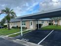 Single Gathering home with carport and landscaping at 11920 Boynton Ln # 11920, New Port Richey, FL 34654