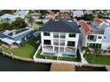 Modern waterfront home with private pool and dock at 160 174Th Terrace E Dr # A, Redington Shores, FL 33708