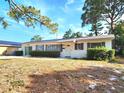Charming single-story home featuring a well-maintained lawn and inviting curb appeal at 2145 68Th S Ave, St Petersburg, FL 33712