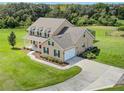 Aerial view of a two-story house with a pool at 8703 Alafia Hills Dr, Plant City, FL 33567