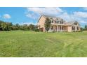 Two-story house with large yard, screened pool and detached barn at 8703 Alafia Hills Dr, Plant City, FL 33567