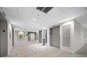 Elegant hallway with elevators and artwork at 1 Beach Se Dr # 1208, St Petersburg, FL 33701