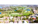 Aerial view of waterfront homes and golf course at 116 Laredo Ne Way, St Petersburg, FL 33704