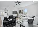 Open concept living room with modern decor and kitchen views at 2316 S 46Th St, Tampa, FL 33619