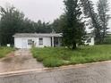 One-story home with a large yard needing landscaping at 1908 51St W Ave, Bradenton, FL 34207