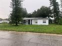 One-story home with a large yard needing landscaping at 1908 51St W Ave, Bradenton, FL 34207