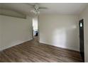 Spacious living room with laminate floors at 8518 N Edison Ave, Tampa, FL 33604