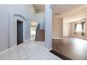 Bright entryway with tiled floor and staircase at 18141 Sandy Pointe Dr, Tampa, FL 33647