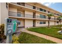 Exterior of building showcasing landscaping and convenient location at 12300 Vonn Rd # 7101, Largo, FL 33774