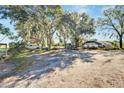 Long driveway leading to property at 11109 Sumner Rd, Wimauma, FL 33598