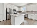 Stylish kitchen featuring stainless steel appliances and a center island at 13719 Brookside Haven St, Riverview, FL 33578