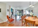 Open living room and dining area with hardwood floors at 242 Shell Falls Dr, Apollo Beach, FL 33572