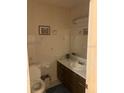 Clean and simple bathroom with updated vanity at 2705 Ranch Rd, Dover, FL 33527