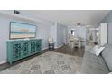 Condo living room with coastal decor and wood floors at 1868 Shore S Dr # 207, South Pasadena, FL 33707