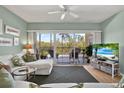 Bright living room with access to a balcony at 6251 Shoreline Dr # 2102, St Petersburg, FL 33708