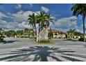 Grand Bellair community entrance with signage at 2757 Via Cipriani # 1132A, Clearwater, FL 33764