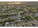 Wide aerial view of a house in a residential neighborhood at 1009 Cobblestone Dr, Spring Hill, FL 34606