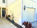 View of the garage and entryway, showcasing the home's exterior at 10823 Verawood Dr, Riverview, FL 33579