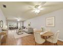 Bright living room featuring a dining area, neutral furniture, and great lighting at 11200 102Nd Ave # 33, Seminole, FL 33778