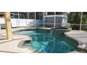 Relaxing pool and spa with a waterfall feature at 2001 Rain Dance Pl, Brandon, FL 33510