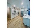 Well-designed kitchen featuring stainless steel appliances, ample counter space, and modern finishes at 4000 Southern Valley Loop, Brooksville, FL 34601