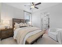 Cozy bedroom with wood bed frame and ensuite bathroom at 4068 Southern Valley Loop, Brooksville, FL 34601
