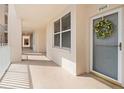 Bright hallway leading to condo unit entrance at 6450 Shoreline Dr # 9105, St Petersburg, FL 33708