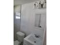 Clean bathroom featuring a vanity, toilet, and shower at 12800 Vassar Ct, Hudson, FL 34667