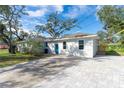 House exterior with driveway and side yard at 701 17Th S Ave, St Petersburg, FL 33701