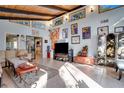 Bright sunroom featuring a high ceiling and eclectic decor at 2406 S Clark Ave, Tampa, FL 33629