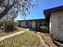 One-story home with a covered entryway and walkway at 620 Dalton Blvd, Port Charlotte, FL 33952