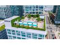 Aerial view of rooftop pool and lounge area at Edition at 1000 Water St # 1402, Tampa, FL 33602