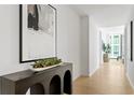 Modern entryway with long console table and artwork at 1000 Water St # 1402, Tampa, FL 33602