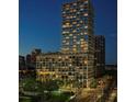Nighttime view of Edition building, well lit at 1000 Water St # 1402, Tampa, FL 33602