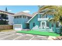 Rear exterior of building boasts ample parking, modern architecture, and convenient access at 532 Beach Ne Dr, St Petersburg, FL 33701