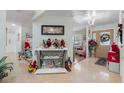 Festive entryway showcasing a decorative console table and Christmas decor at 4608 Apple Ridge Ln, Tampa, FL 33624