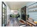 Inviting front porch with seating area, perfect for relaxing at 3405 E 33Rd Ave, Tampa, FL 33610