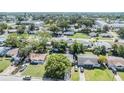 Aerial view showcasing the home's neighborhood and surrounding area at 5410 Palm Drive, New Port Richey, FL 34652