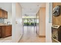 Clean entryway with view into living area and kitchen at 36750 Us Highway 19 N # 19106, Palm Harbor, FL 34684