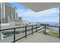 Spacious balcony offering stunning water and city views from a modern highrise building at 301 1St S St # 1604, St Petersburg, FL 33701