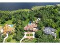 Luxury waterfront home with expansive grounds at 7734 Still Lakes Dr, Odessa, FL 33556