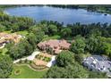 Luxury waterfront home with expansive grounds at 7734 Still Lakes Dr, Odessa, FL 33556