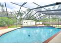 Relaxing screened pool with brick coping at 108 Laurel Tree Way, Brandon, FL 33511