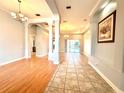 Bright dining room with wood and tile flooring at 10411 Riverburn Dr, Tampa, FL 33647