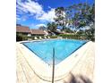 Clean and refreshing community swimming pool at 3600 Magnolia Ridge Cir # 1221-G, Palm Harbor, FL 34684