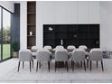 Modern dining room with large table and built-in shelving at 1076 Snell Isle Ne Blvd, St Petersburg, FL 33704