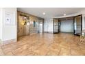 Building lobby with two elevators and tile flooring at 5200 Brittany S Dr # 1202, St Petersburg, FL 33715